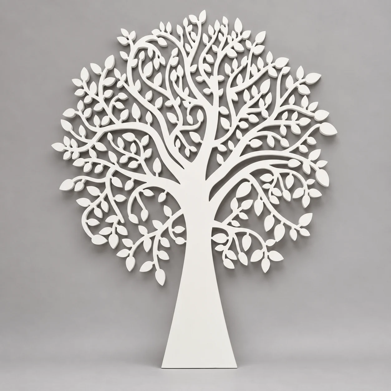White CNC cutout of a broad leafy Tree of Life